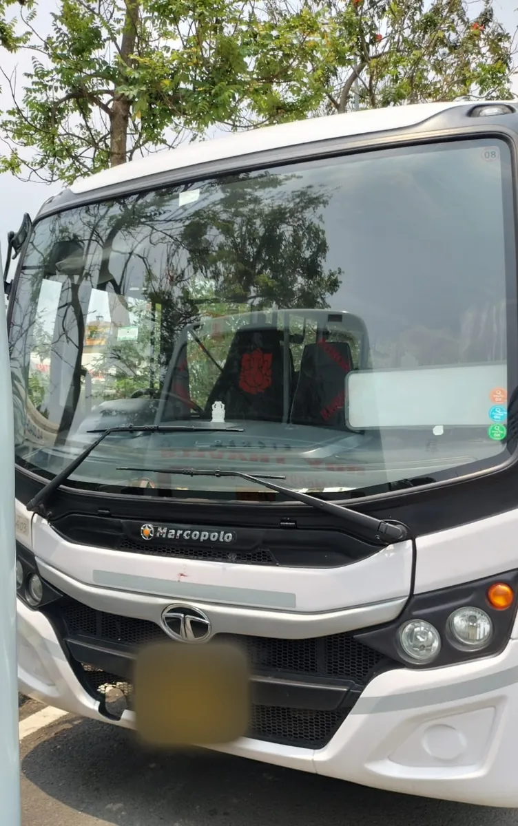 Front of a white Tata Marcopolo coach