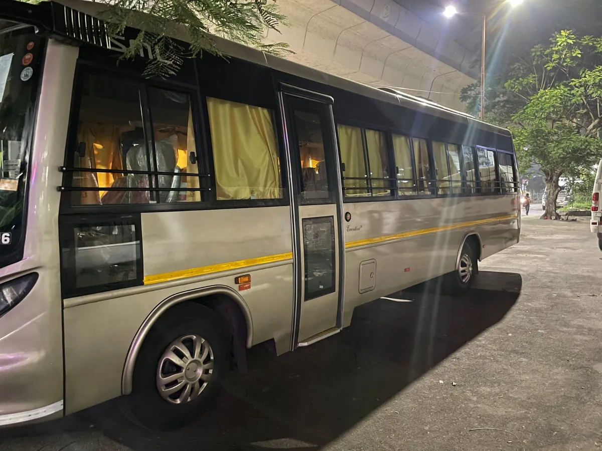 Mini bus parked at night with curtains drawn